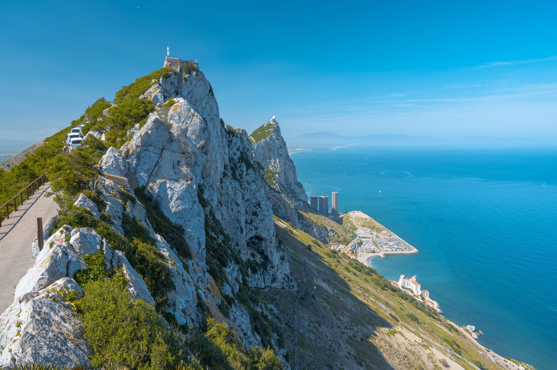 The Rock of Gibraltar rising over the town and harbour under a clear sky