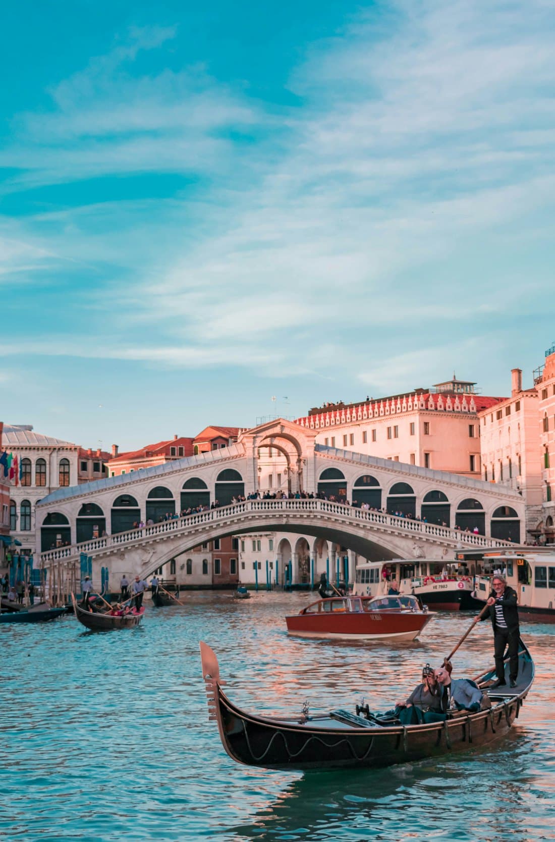 Gondolas by the Rialto Bridge in Venice, Italy