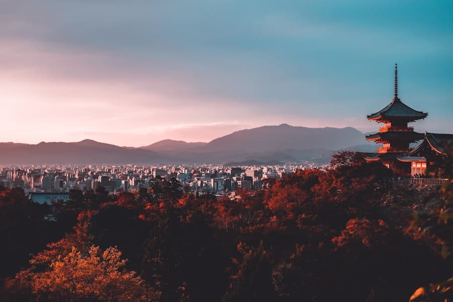 A historic pagoda above the rooftops of Kyoto, Japan