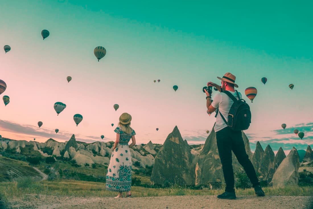 Hot air balloons rising over Cappadocia at sunrise, Turkey
