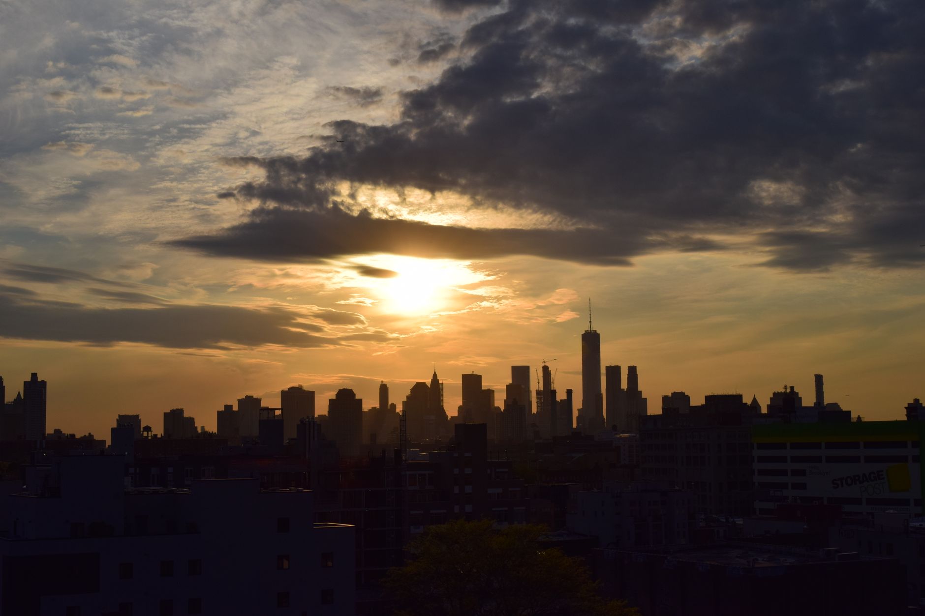 A vibrant city skyline at sunset, with a clear view, suggesting good potential for mobile network connectivity.