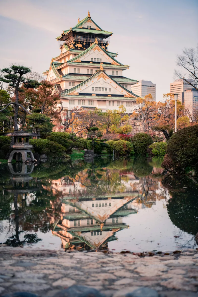Things to do in Japan Osaka – Dotonbori canal with food stalls and neon signs.