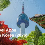 N Seoul Tower in Seoul, South Korea, with a traditional Korean pavilion roof and autumn foliage.